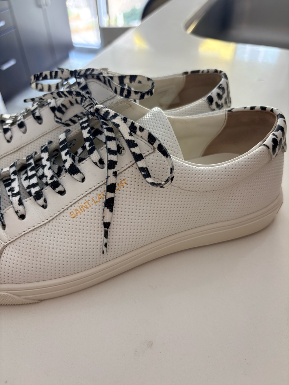 Saint Laurent White Perforated Leather Sneakers with Black & White Leopard Laces